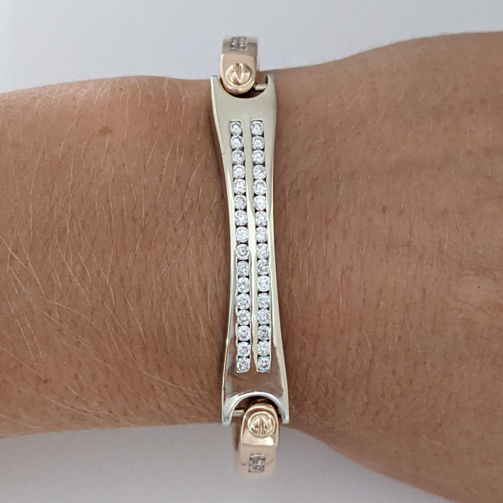 14K TWO- TONE 1.26 CARAT TOTAL WEIGHT I1 G DIAMOND ROUND (38) ESTATE CHANNEL-SET BRACELET 26.4 GRAMS