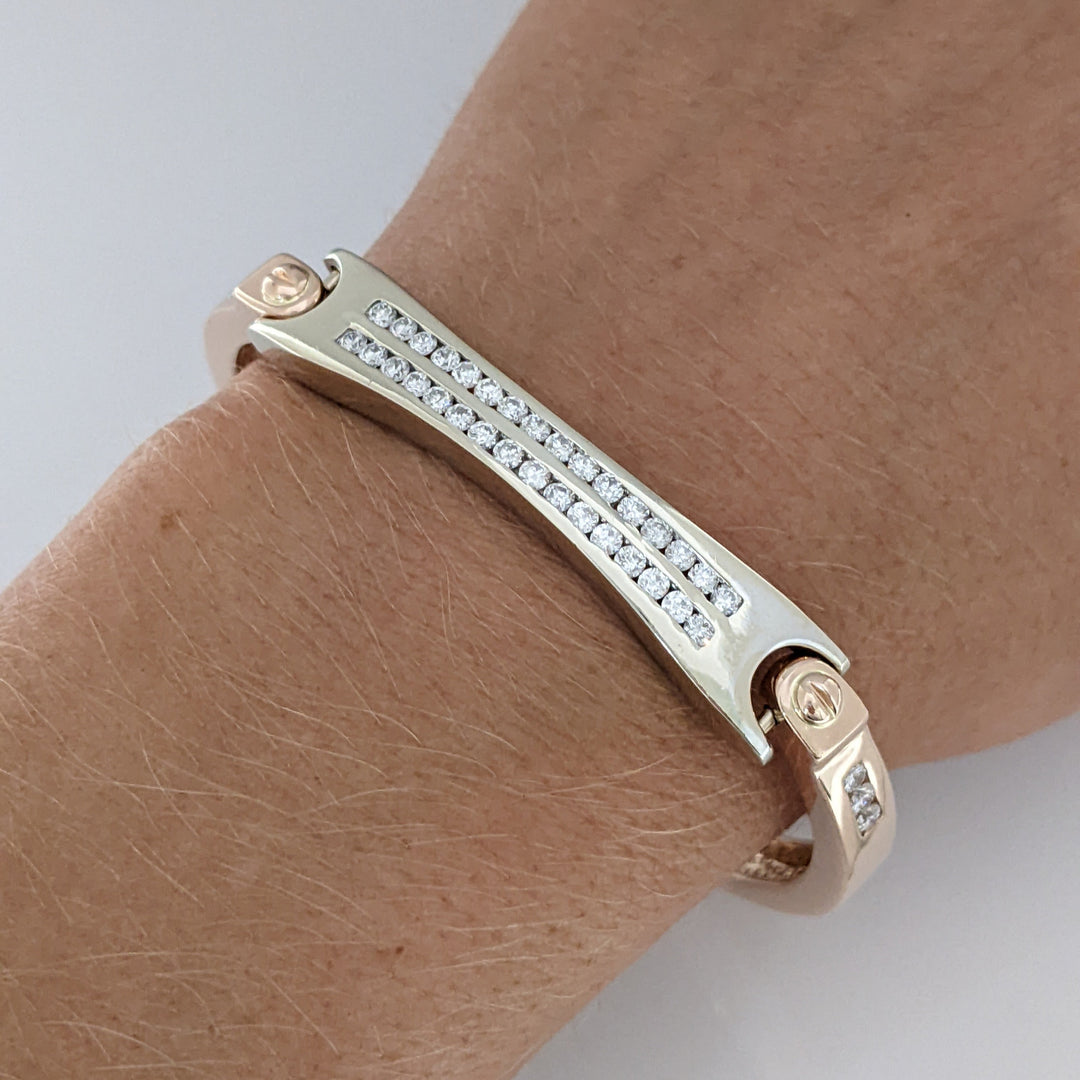 14K TWO- TONE 1.26 CARAT TOTAL WEIGHT I1 G DIAMOND ROUND (38) ESTATE CHANNEL-SET BRACELET 26.4 GRAMS