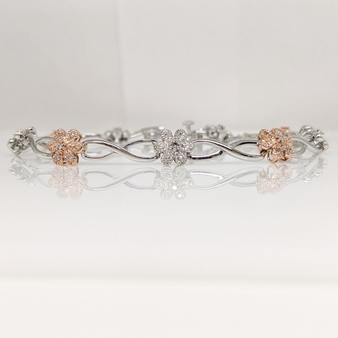 10K TWO-TONE 1.00 CARAT TOTAL WEIGHT DIAMOND ROUND PROMOTIONAL FLORAL LINK ESTATE BRACELET 8.6 GRAMS