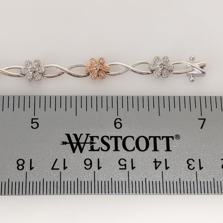 10K TWO-TONE 1.00 CARAT TOTAL WEIGHT DIAMOND ROUND PROMOTIONAL FLORAL LINK ESTATE BRACELET 8.6 GRAMS