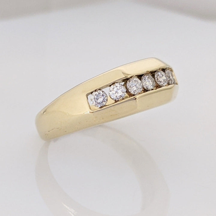 14K .49 CARAT TOTAL WEIGHT I1 J DIAMOND ROUND (7) ESATE CHANNEL SET BAND 6.4 GRAMS