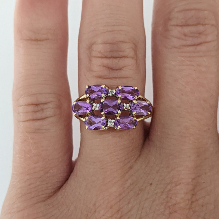 10K AMETHYST OVAL (7) 3X5 WTH (4) MELEE ESTATE RING 2.7 GRAMS