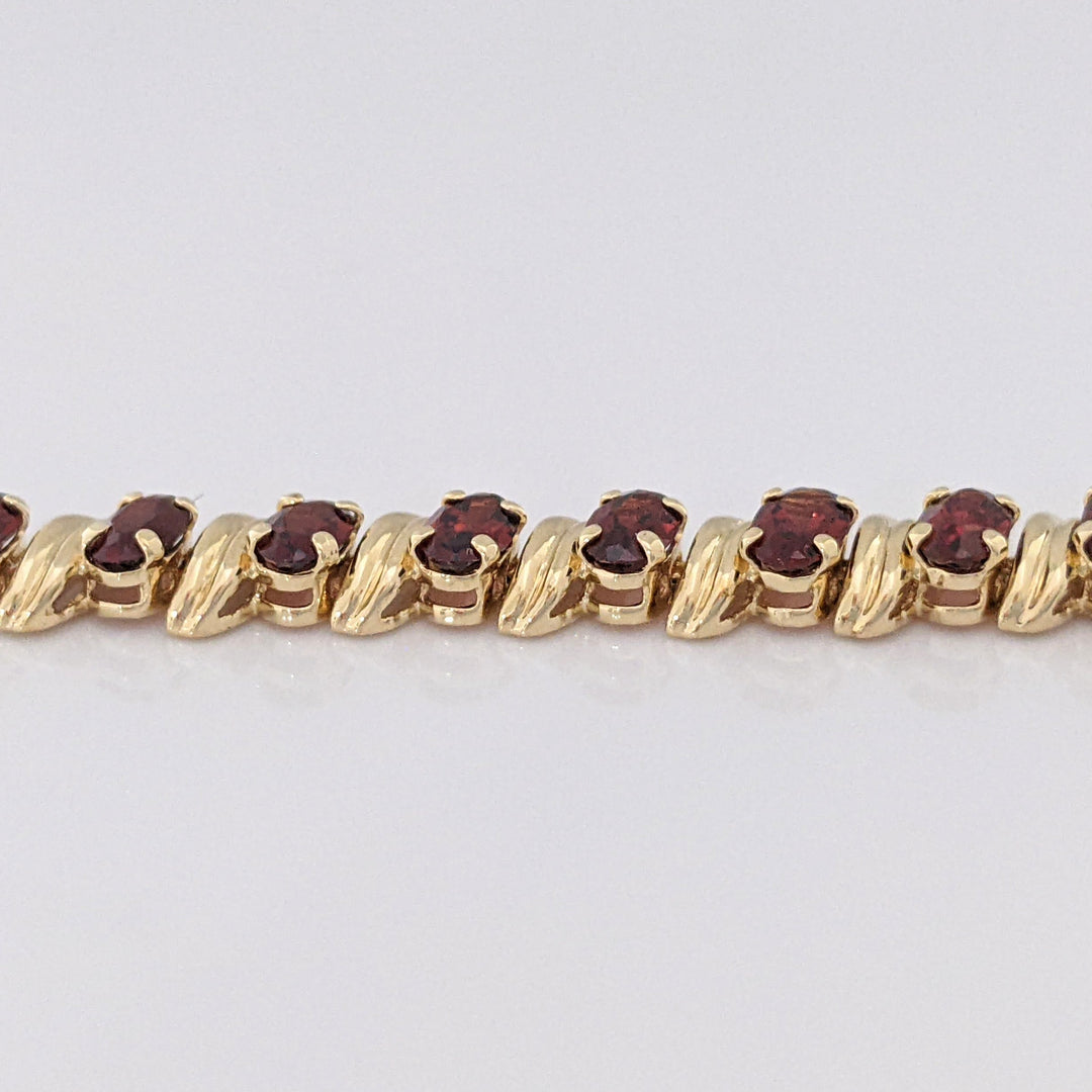 14K GARNET OVAL (31) 3X5 ESTATE BRACELET 8.7 GRAMS