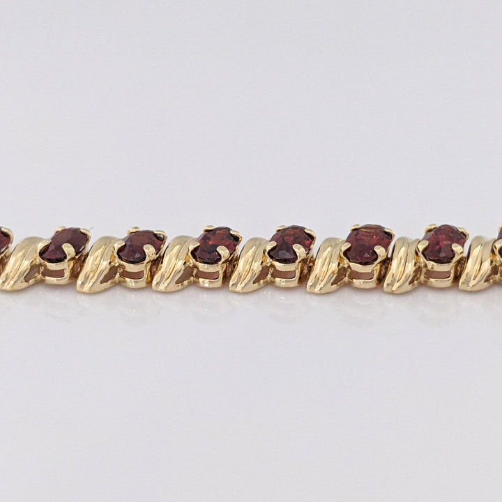 14K GARNET OVAL (31) 3X5 ESTATE BRACELET 8.7 GRAMS