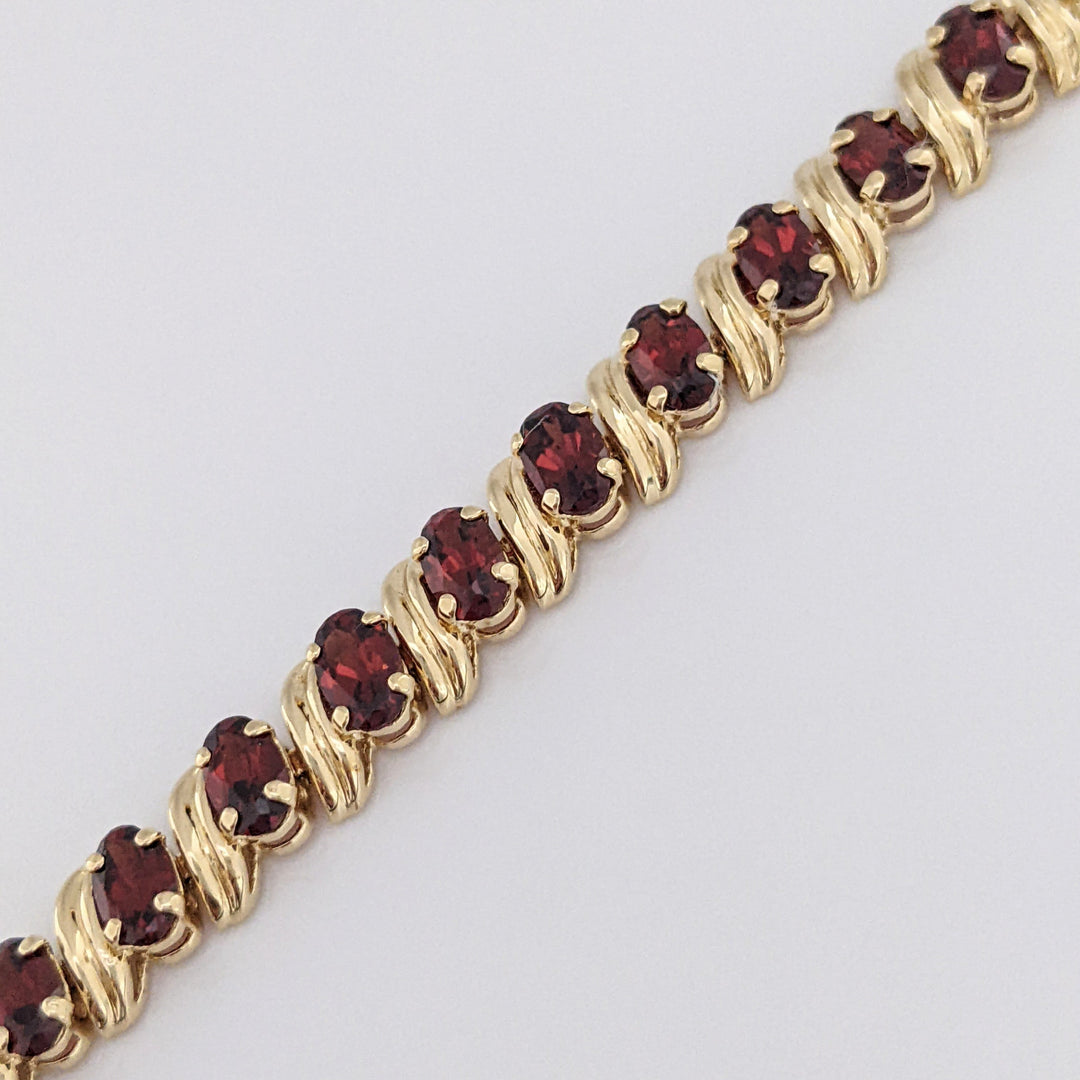 14K GARNET OVAL (31) 3X5 ESTATE BRACELET 8.7 GRAMS