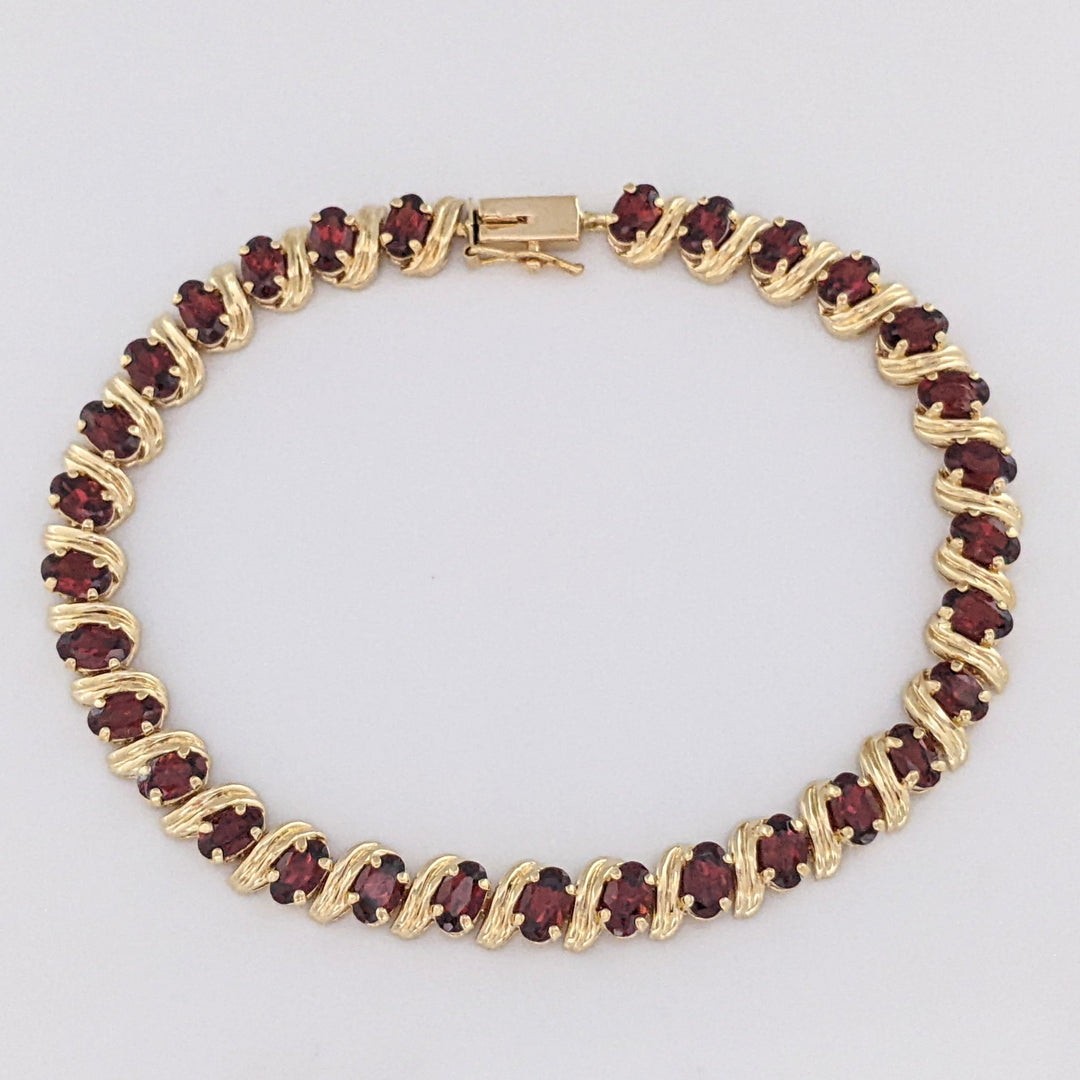 14K GARNET OVAL (31) 3X5 ESTATE BRACELET 8.7 GRAMS