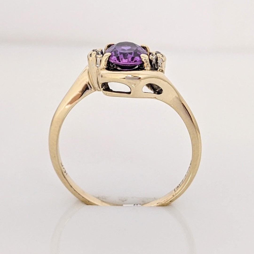 10K AMETHYST OVAL 5X7 WITH (2) MELEE GOLD TRIM ESTATE RING 2.3 GRAMS