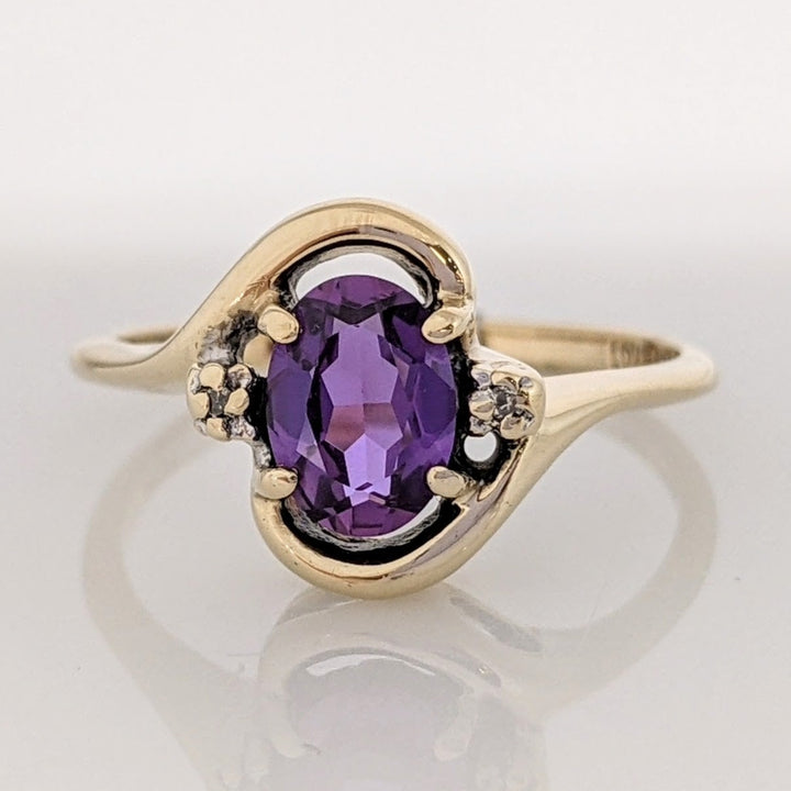 10K AMETHYST OVAL 5X7 WITH (2) MELEE GOLD TRIM ESTATE RING 2.3 GRAMS