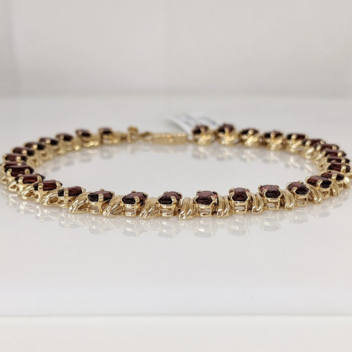 14K GARNET OVAL (31) 3X5 ESTATE BRACELET 8.7 GRAMS