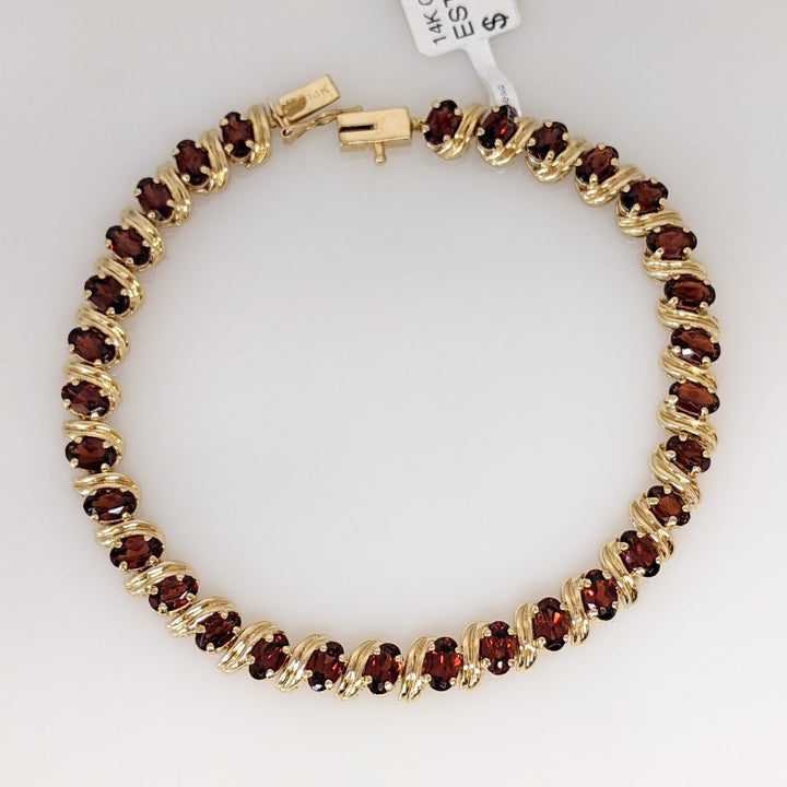 14K GARNET OVAL (31) 3X5 ESTATE BRACELET 8.7 GRAMS