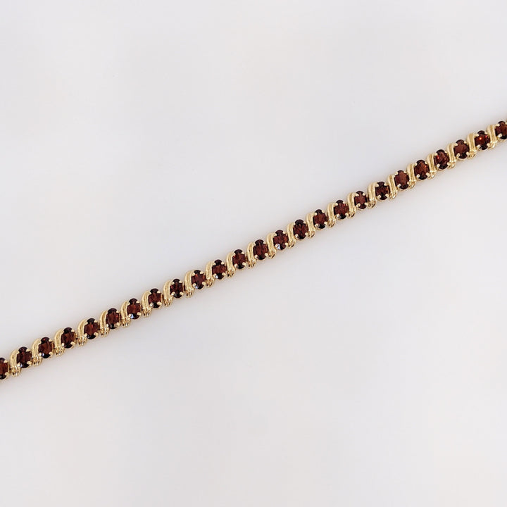 14K GARNET OVAL (31) 3X5 ESTATE BRACELET 8.7 GRAMS