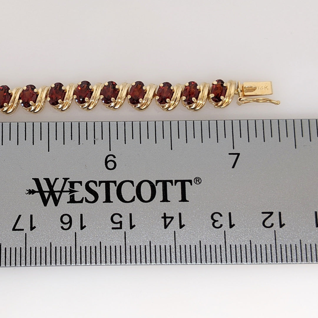 14K GARNET OVAL (31) 3X5 ESTATE BRACELET 8.7 GRAMS