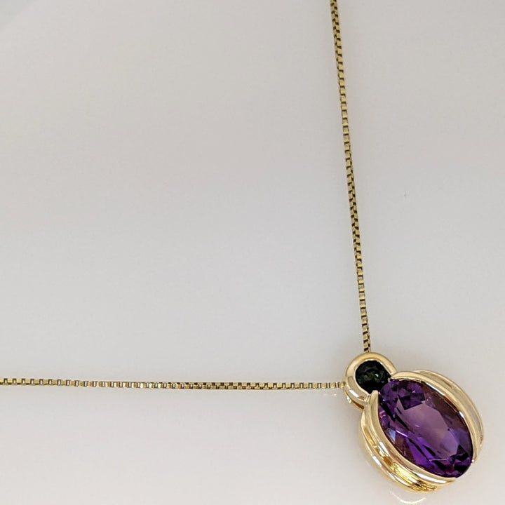 14K AMETHYST OVAL 7X10 WITH 3.0MM GREEN TOURMALINE BEZEL ESTATE PENDANT & CHAIN 3.7 GRAMS