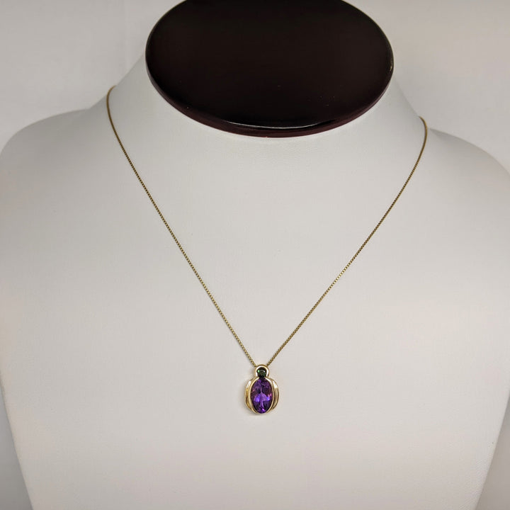 14K AMETHYST OVAL 7X10 WITH 3.0MM GREEN TOURMALINE BEZEL ESTATE PENDANT & CHAIN 3.7 GRAMS