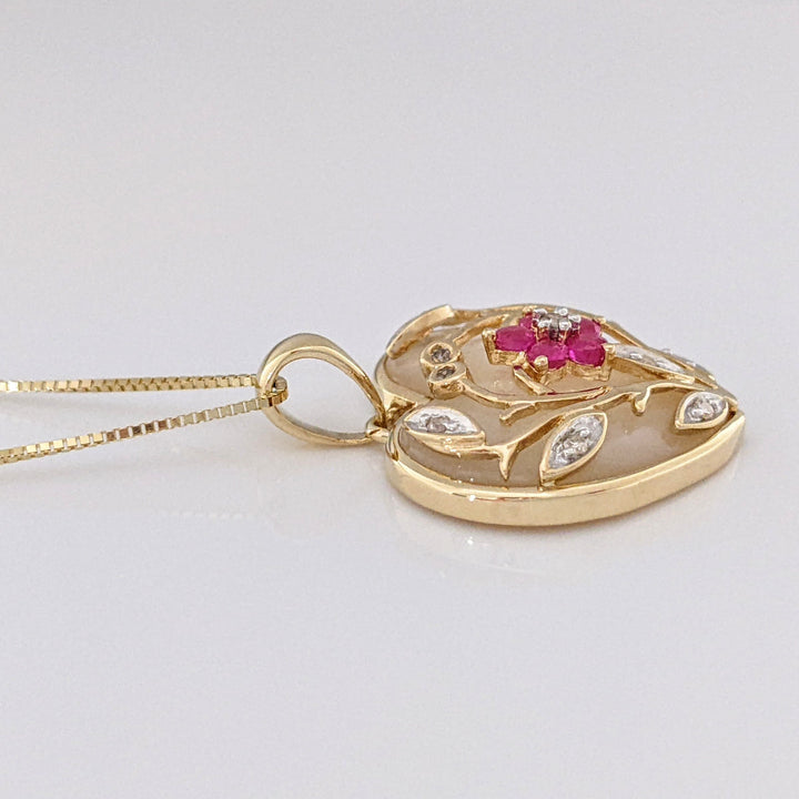 10K MOTHER OF PEARL HEART WITH (5) RUBY ROUND AND MELEE ESTATE PENDANT & CHAIN 4.3 GRAMS