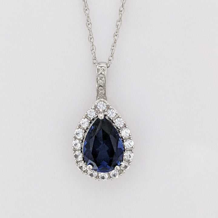 10K WHITE LAB- CREATED SAPPHIRE PEAR 7X10 (1) 5X8 (2) WITH .67 DIAMOND TOTAL WEIGHT ESTATE PENDANT, CHAIN, & EARRING SET 5.1 GRAMS
