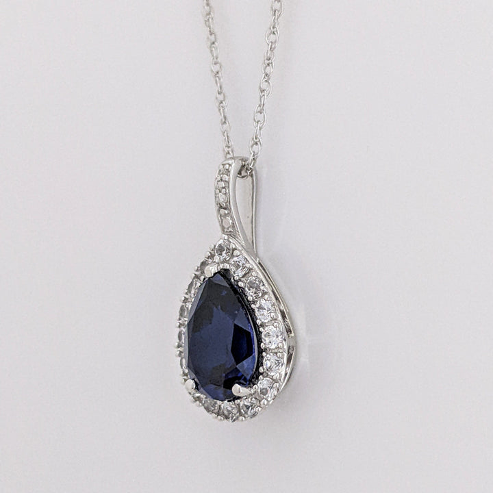 10K WHITE LAB- CREATED SAPPHIRE PEAR 7X10 (1) 5X8 (2) WITH .67 DIAMOND TOTAL WEIGHT ESTATE PENDANT, CHAIN, & EARRING SET 5.1 GRAMS