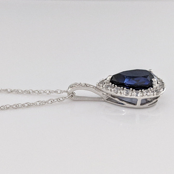 10K WHITE LAB- CREATED SAPPHIRE PEAR 7X10 (1) 5X8 (2) WITH .67 DIAMOND TOTAL WEIGHT ESTATE PENDANT, CHAIN, & EARRING SET 5.1 GRAMS
