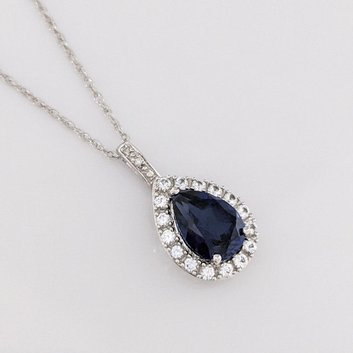 10K WHITE LAB- CREATED SAPPHIRE PEAR 7X10 (1) 5X8 (2) WITH .67 DIAMOND TOTAL WEIGHT ESTATE PENDANT, CHAIN, & EARRING SET 5.1 GRAMS