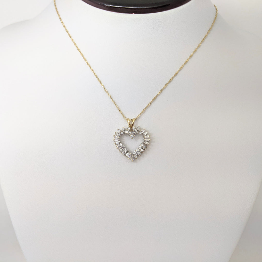 14K .76 CARAT TOTAL WEIGHT I1 H DIAMOND ROUND (27) BAGUETTE (11) ESTATE HEART PENDANT & CHAIN 4.4 GRAMS