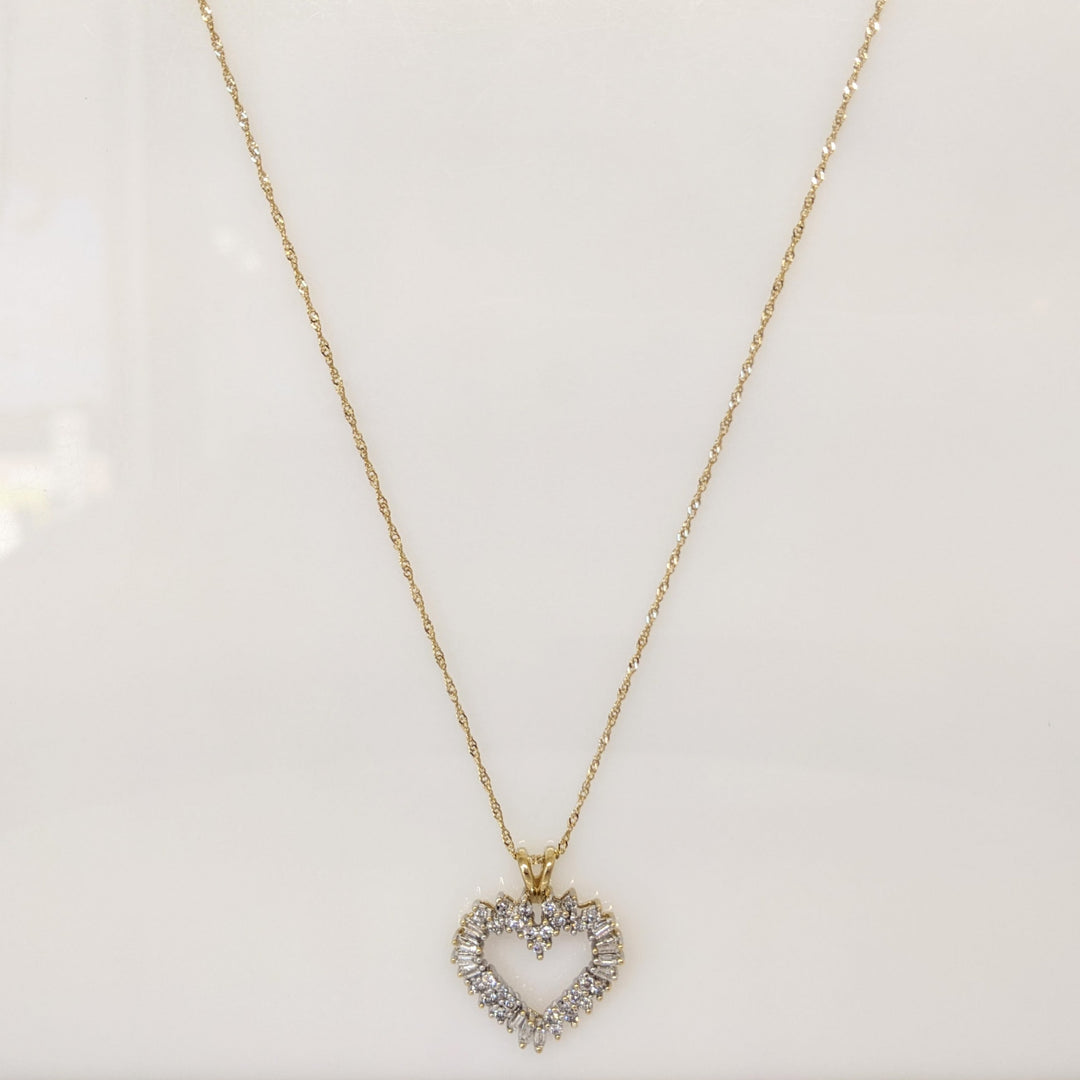 14K .76 CARAT TOTAL WEIGHT I1 H DIAMOND ROUND (27) BAGUETTE (11) ESTATE HEART PENDANT & CHAIN 4.4 GRAMS