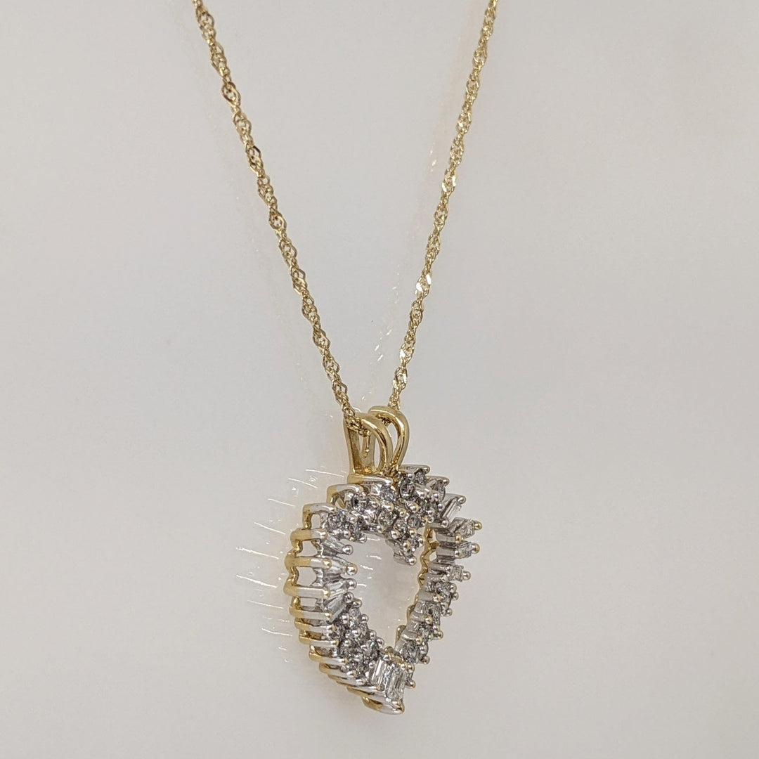 14K .76 CARAT TOTAL WEIGHT I1 H DIAMOND ROUND (27) BAGUETTE (11) ESTATE HEART PENDANT & CHAIN 4.4 GRAMS