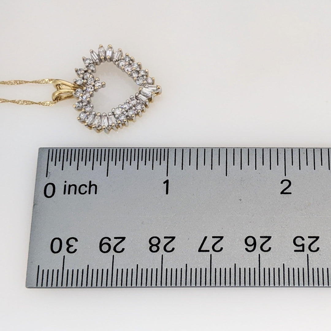 14K .76 CARAT TOTAL WEIGHT I1 H DIAMOND ROUND (27) BAGUETTE (11) ESTATE HEART PENDANT & CHAIN 4.4 GRAMS
