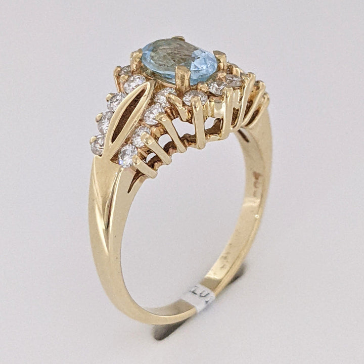 14K BLUE TOPAZ OVAL 5X7 WITH .55 DIAMOND TOTAL WEIGHT (22) ESTATE RING 4.5 GRAMS