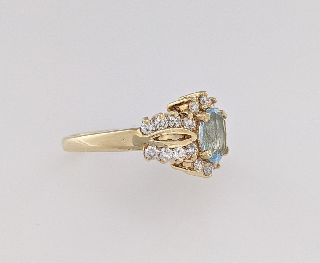 14K BLUE TOPAZ OVAL 5X7 WITH .55 DIAMOND TOTAL WEIGHT (22) ESTATE RING 4.5 GRAMS