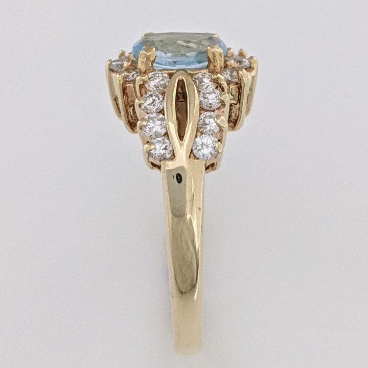 14K BLUE TOPAZ OVAL 5X7 WITH .55 DIAMOND TOTAL WEIGHT (22) ESTATE RING 4.5 GRAMS