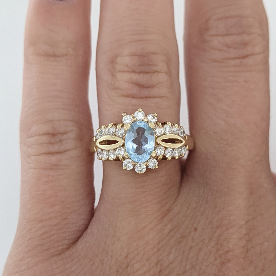 14K BLUE TOPAZ OVAL 5X7 WITH .55 DIAMOND TOTAL WEIGHT (22) ESTATE RING 4.5 GRAMS