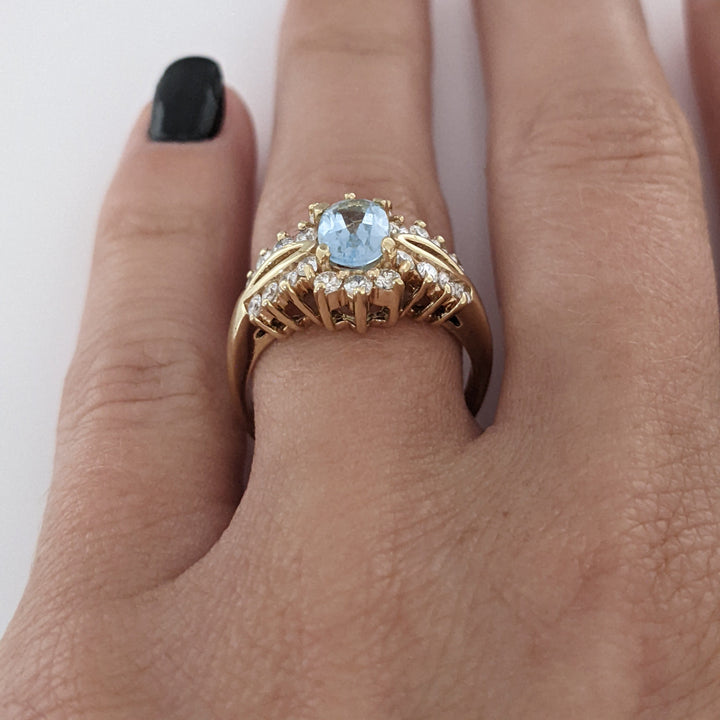 14K BLUE TOPAZ OVAL 5X7 WITH .55 DIAMOND TOTAL WEIGHT (22) ESTATE RING 4.5 GRAMS