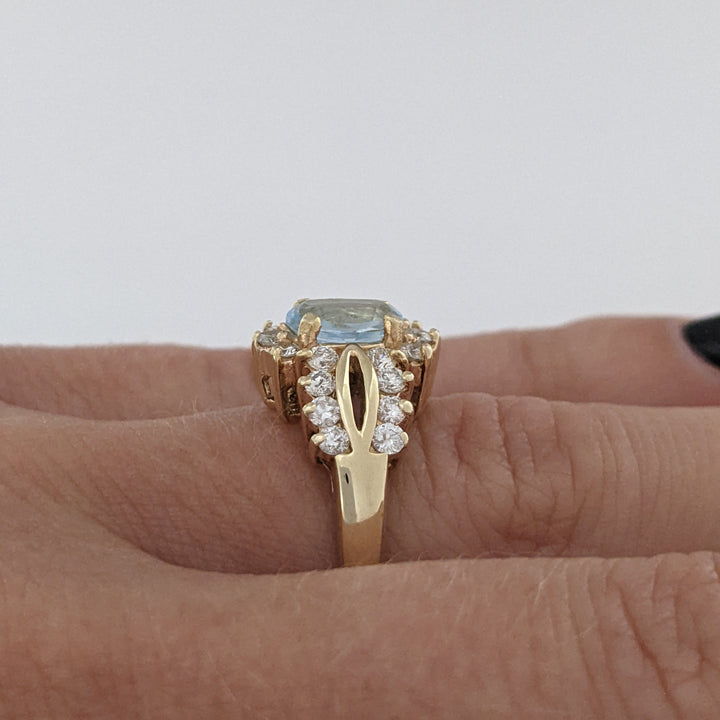 14K BLUE TOPAZ OVAL 5X7 WITH .55 DIAMOND TOTAL WEIGHT (22) ESTATE RING 4.5 GRAMS