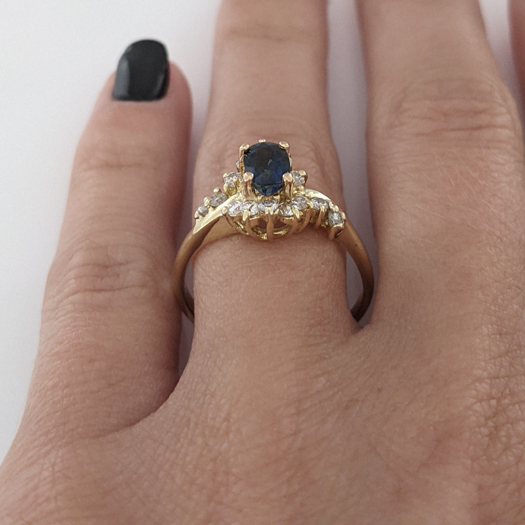 14K SAPPHIRE OVAL 4X6 WITH .35 CARAT TOTAL WEIGHT (14) ROUND ESTATE RING 3.1 GRAMS