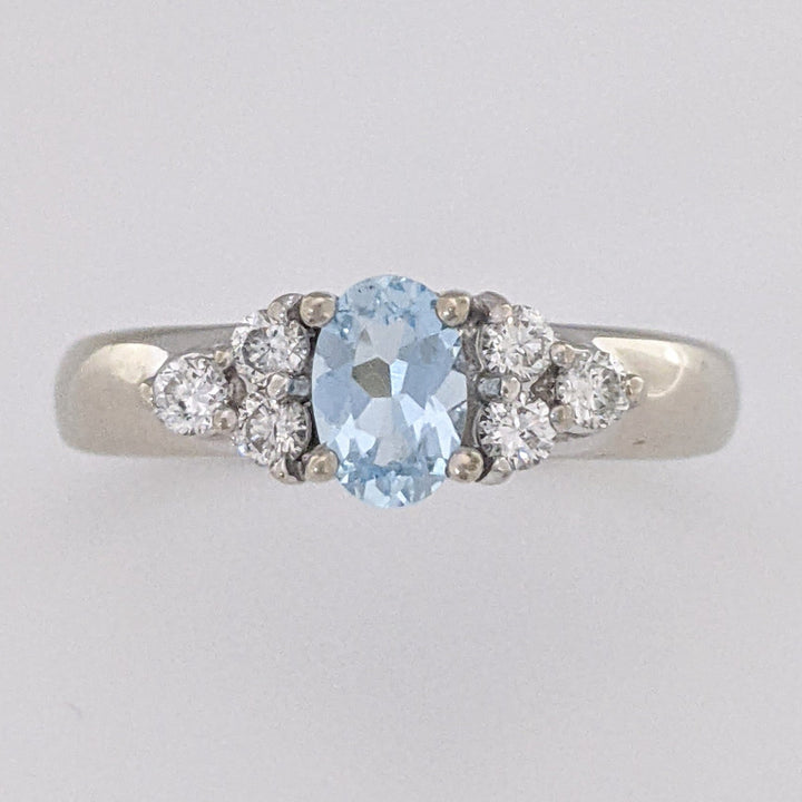 14K WHITE AQUAMARINE OVAL 4X6 WITH .18 DIAMOND TOTAL WEIGHT (6) ROUND ESTATE RING 3.1 GRAMS