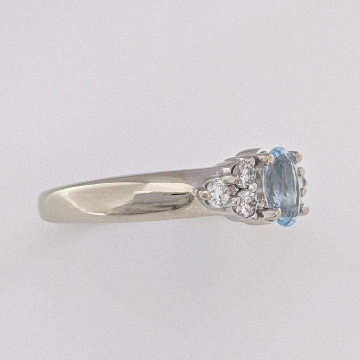 14K WHITE AQUAMARINE OVAL 4X6 WITH .18 DIAMOND TOTAL WEIGHT (6) ROUND ESTATE RING 3.1 GRAMS