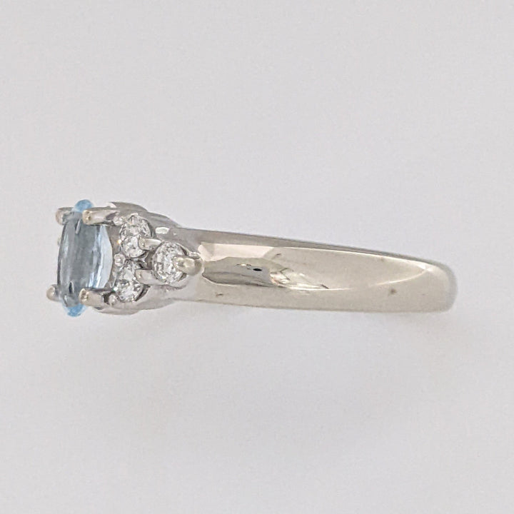 14K WHITE AQUAMARINE OVAL 4X6 WITH .18 DIAMOND TOTAL WEIGHT (6) ROUND ESTATE RING 3.1 GRAMS