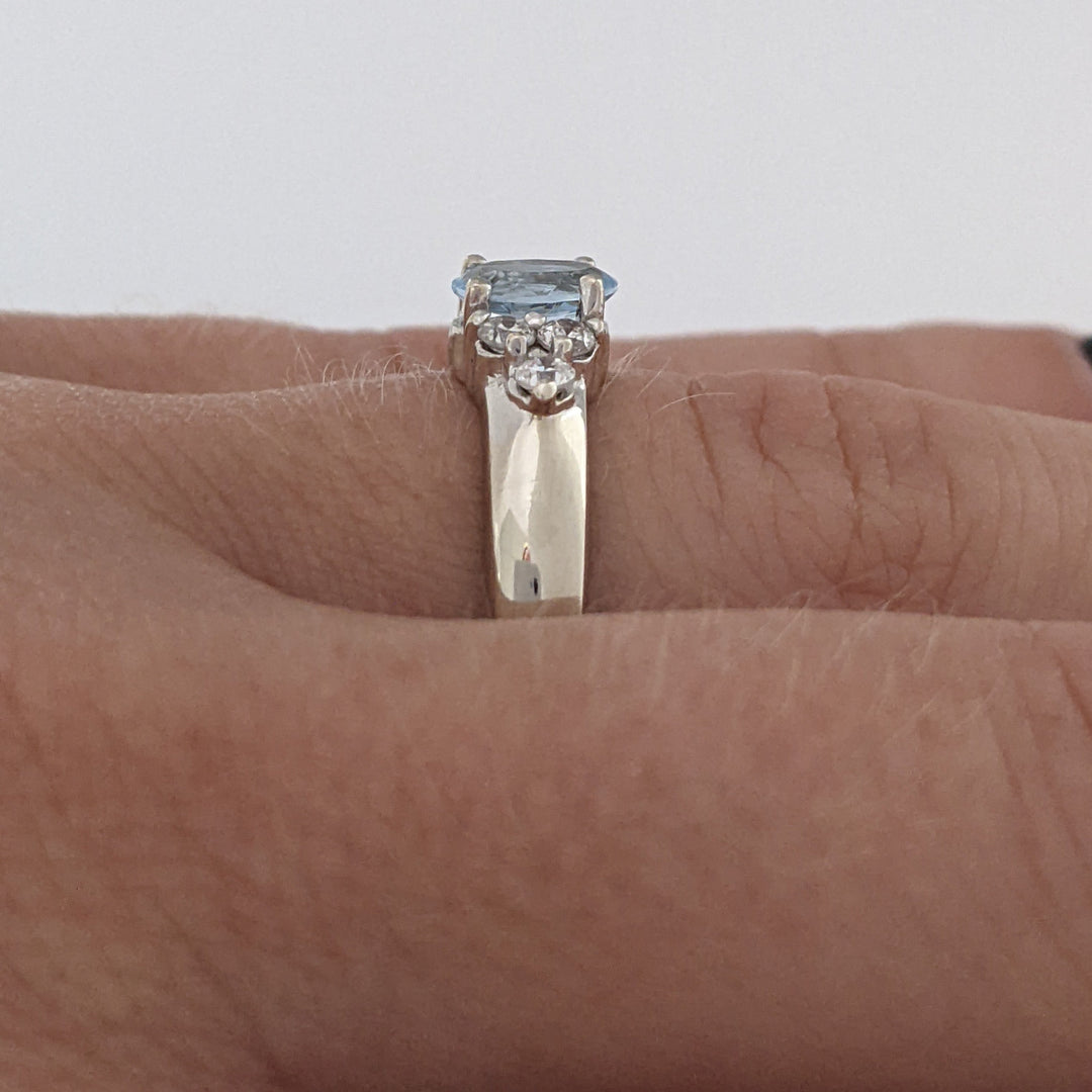 14K WHITE AQUAMARINE OVAL 4X6 WITH .18 DIAMOND TOTAL WEIGHT (6) ROUND ESTATE RING 3.1 GRAMS