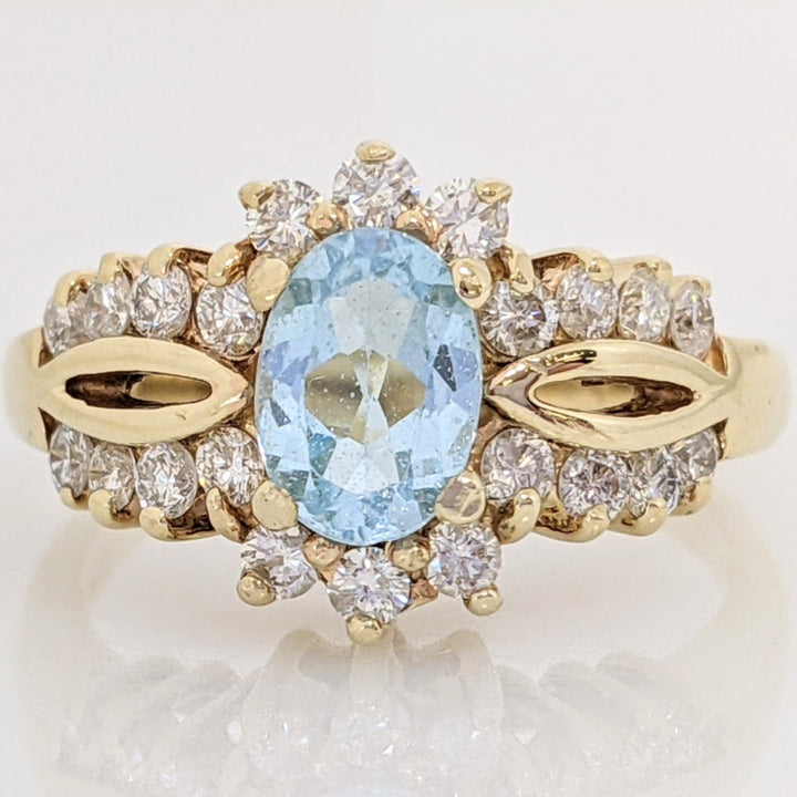 14K BLUE TOPAZ OVAL 5X7 WITH .55 DIAMOND TOTAL WEIGHT (22) ESTATE RING 4.5 GRAMS