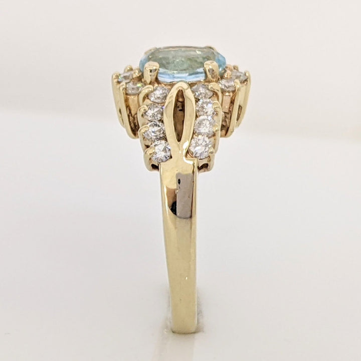 14K BLUE TOPAZ OVAL 5X7 WITH .55 DIAMOND TOTAL WEIGHT (22) ESTATE RING 4.5 GRAMS