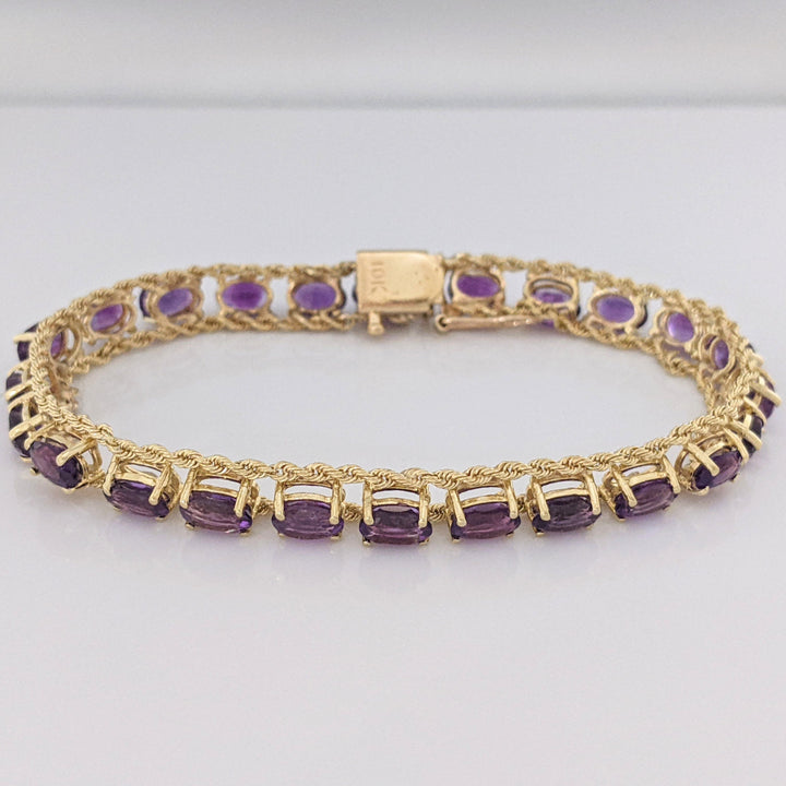 10K AMETHYST OVAL (24) 4X6 ROPE TRIM ESTATE BRACELET 10.9 GRAMS