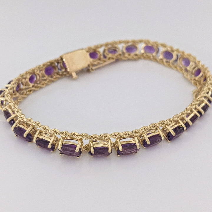 10K AMETHYST OVAL (24) 4X6 ROPE TRIM ESTATE BRACELET 10.9 GRAMS