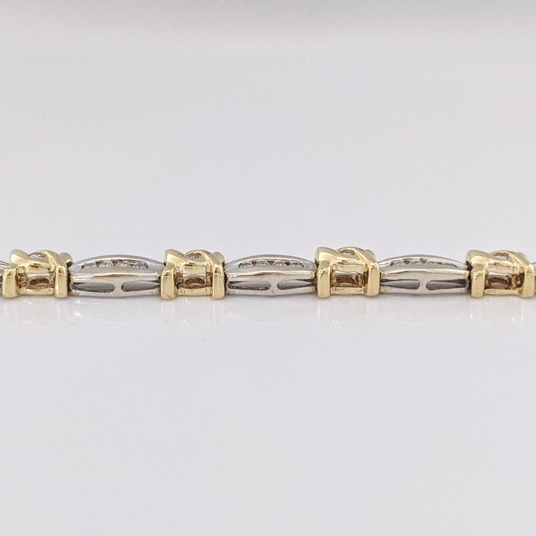 14K TWO-TONE .98 CARAT TOTAL WEIGHT I1 J-K DIAMOND ROUND (60) CHANNEL SET LINK ESTATE BRACELET 12.7 GRAMS