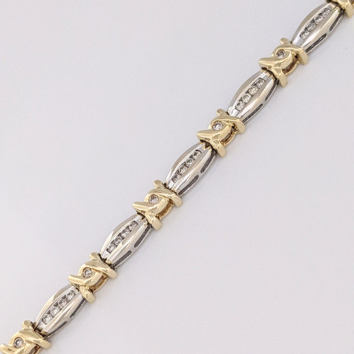14K TWO-TONE .98 CARAT TOTAL WEIGHT I1 J-K DIAMOND ROUND (60) CHANNEL SET LINK ESTATE BRACELET 12.7 GRAMS