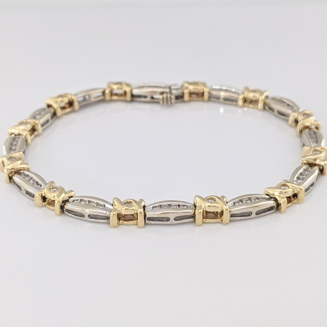 14K TWO-TONE .98 CARAT TOTAL WEIGHT I1 J-K DIAMOND ROUND (60) CHANNEL SET LINK ESTATE BRACELET 12.7 GRAMS