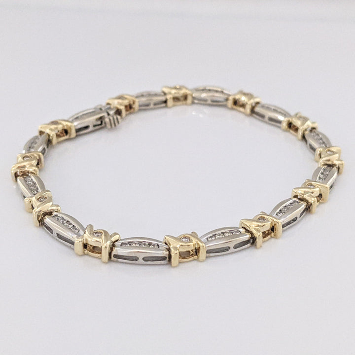 14K TWO-TONE .98 CARAT TOTAL WEIGHT I1 J-K DIAMOND ROUND (60) CHANNEL SET LINK ESTATE BRACELET 12.7 GRAMS
