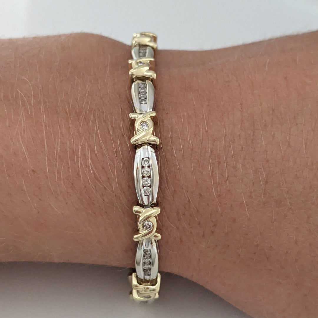 14K TWO-TONE .98 CARAT TOTAL WEIGHT I1 J-K DIAMOND ROUND (60) CHANNEL SET LINK ESTATE BRACELET 12.7 GRAMS