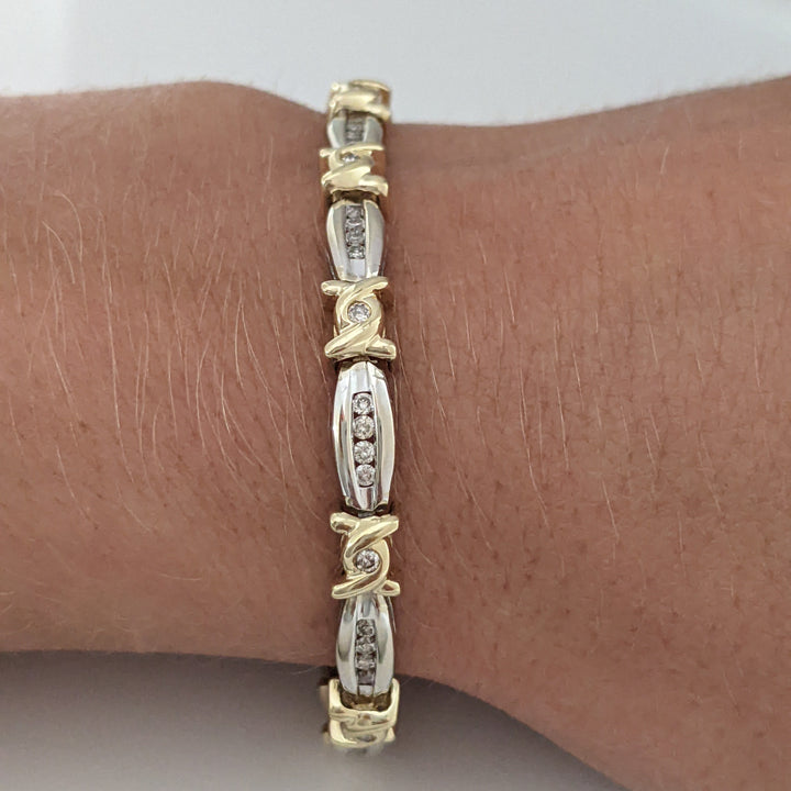 14K TWO-TONE .98 CARAT TOTAL WEIGHT I1 J-K DIAMOND ROUND (60) CHANNEL SET LINK ESTATE BRACELET 12.7 GRAMS