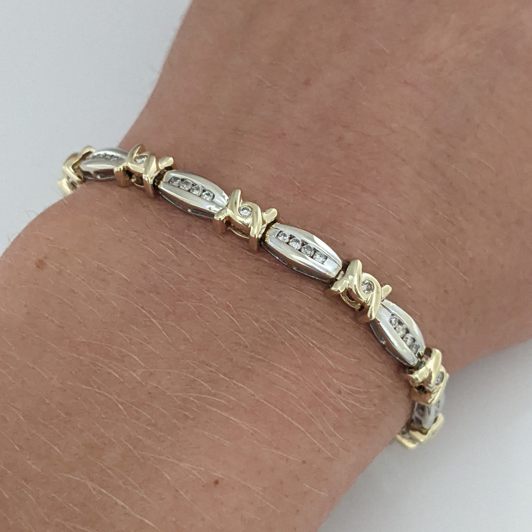 14K TWO-TONE .98 CARAT TOTAL WEIGHT I1 J-K DIAMOND ROUND (60) CHANNEL SET LINK ESTATE BRACELET 12.7 GRAMS