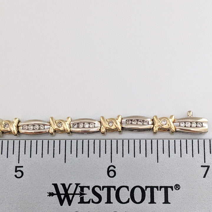 14K TWO-TONE .98 CARAT TOTAL WEIGHT I1 J-K DIAMOND ROUND (60) CHANNEL SET LINK ESTATE BRACELET 12.7 GRAMS